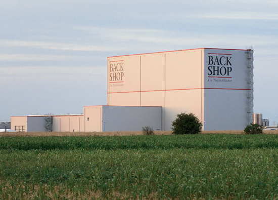 Facade from Back Shop high bay warehouse