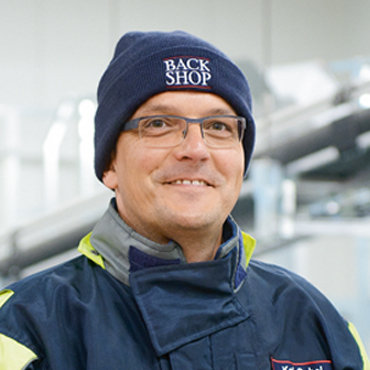 Portrait von Kai Gebel, Operations Manager Back Shop