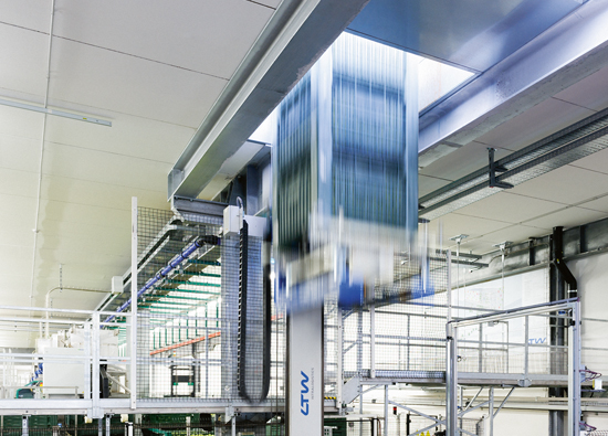 The two-storey, automatic conveyor system is connected with two vertical lifts