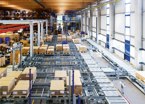 Conveyor system on two levels with storage and retrieval stations and order picking area on the ground floor including vertical lidts, lifting assistances, strapping machine and fire protection gates Conveyor system on two levels with storage and retrieval stations and order picking area on the ground floor including vertical lidts, lifting assistances, strapping machine and fire protection gates